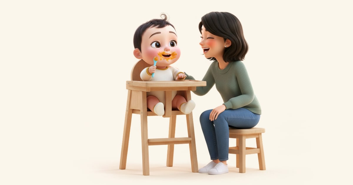 A baby in a high chair holds a soft spoon, a little messy from her first foods, while her mother laughs.